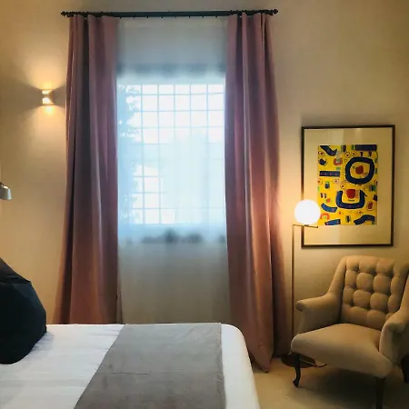 Отель Battimandorlo